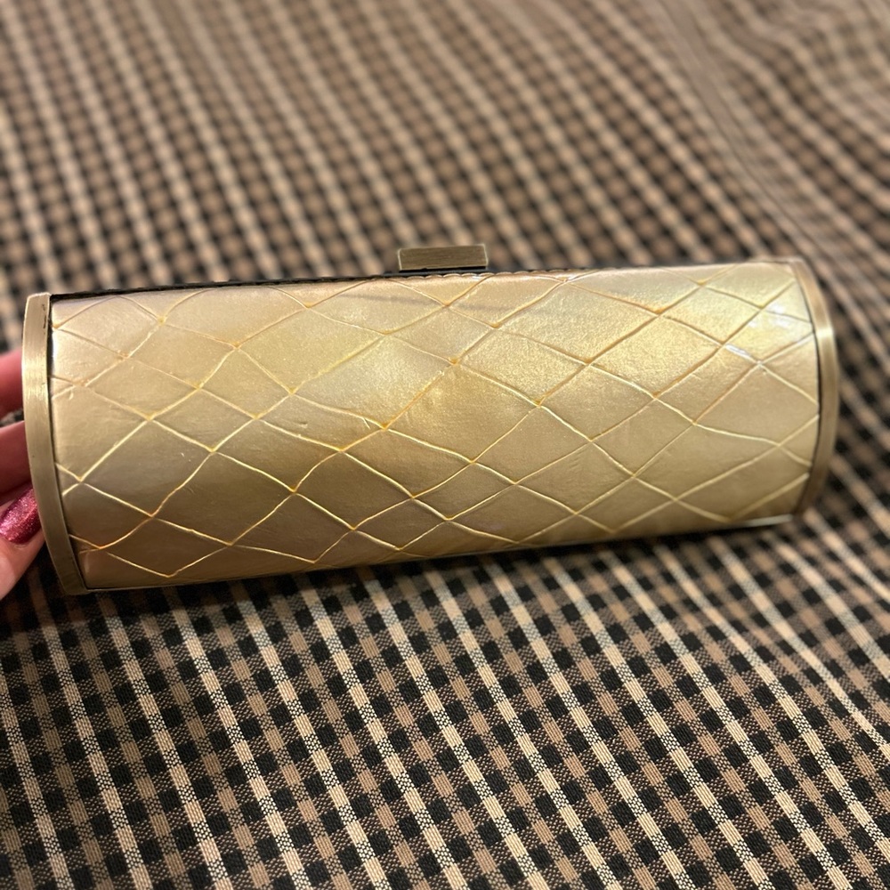 Used Kenneth Cole Reaction gold clutch. - Picture 1 of 6